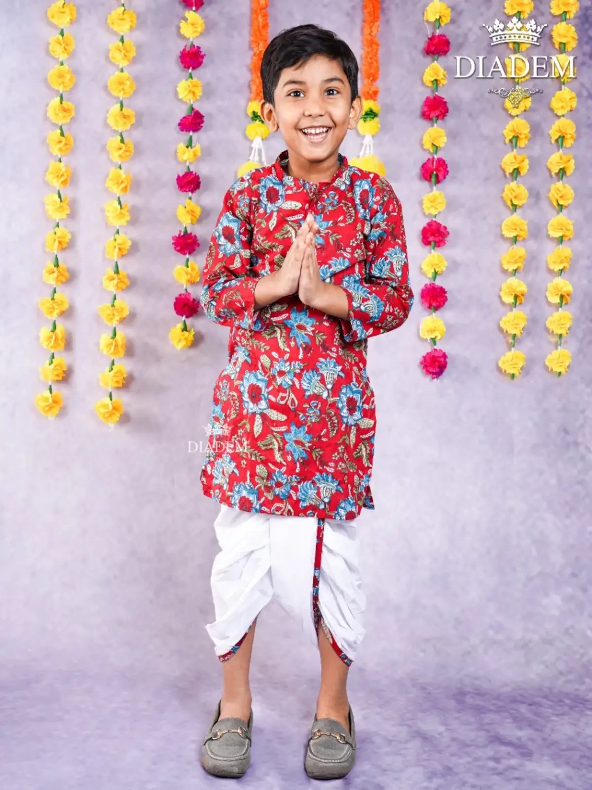 Deep Carmine Kurta Adorned In Floral Prints And Paired With Off White Dhoti Pants