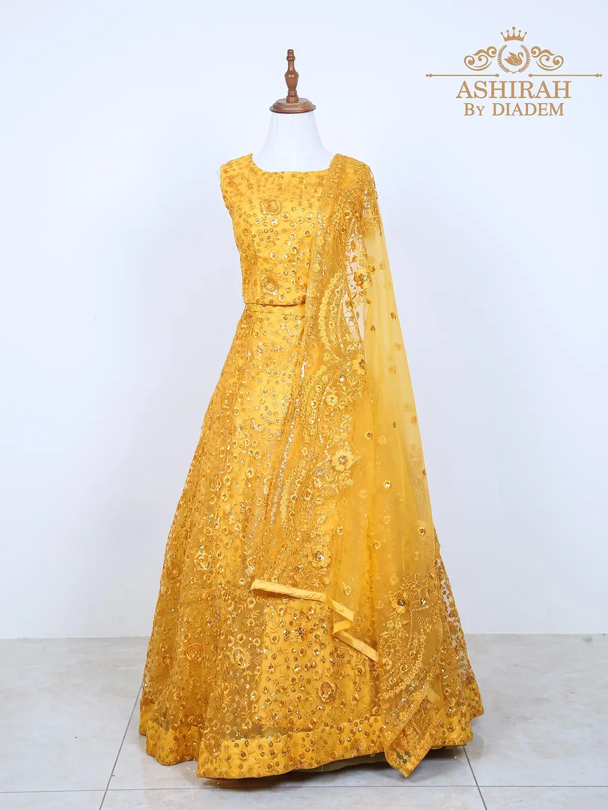 Yellow Net Lehenga Embroidered with Threads and Sequins with Dupatta