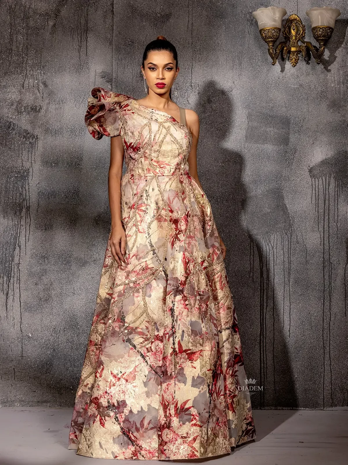 Ivory Gown Adorned With Floral Prints And Shimmers