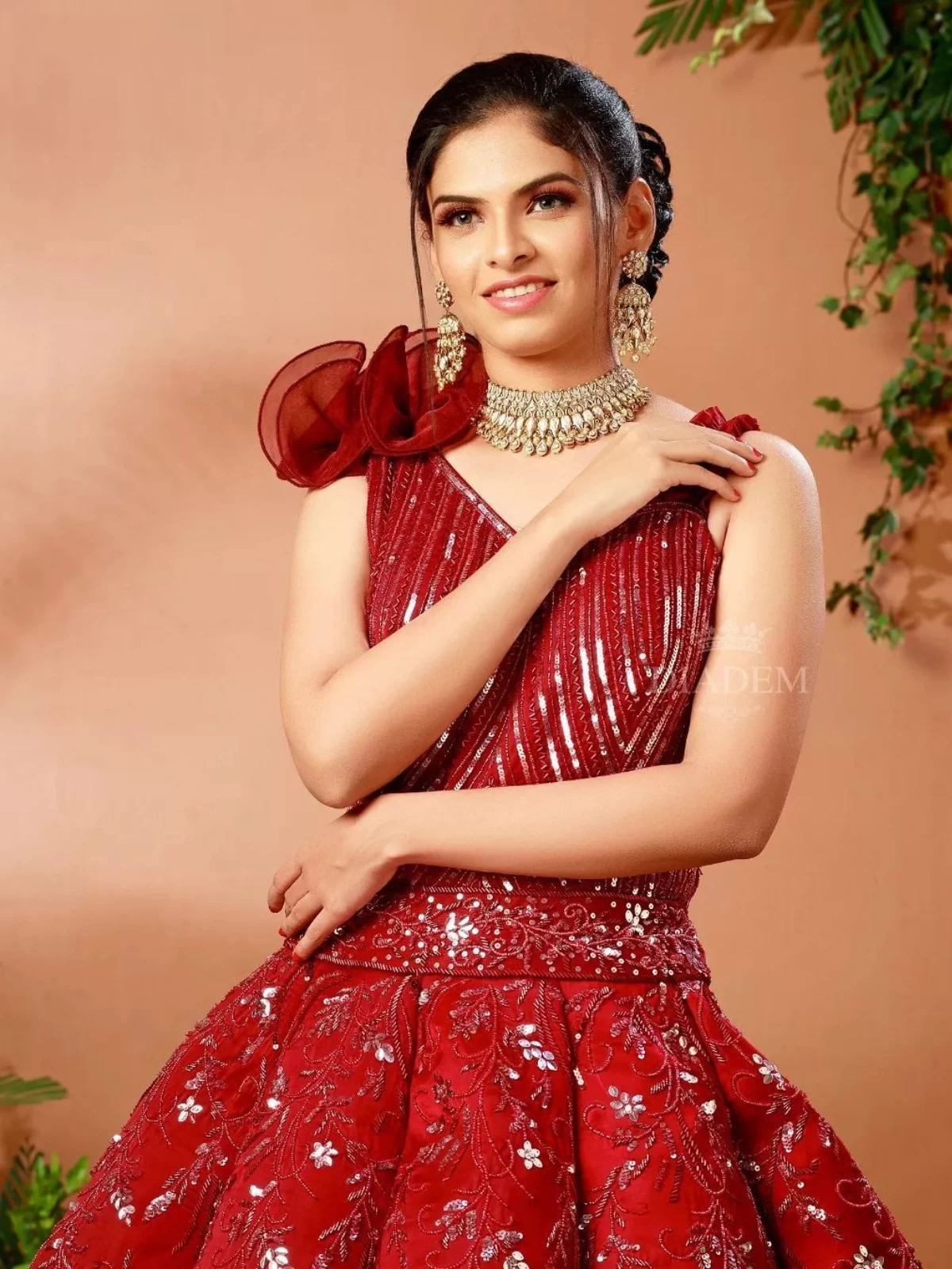 Dark Red Gown Embellished With Sequins And Floral Design Stones