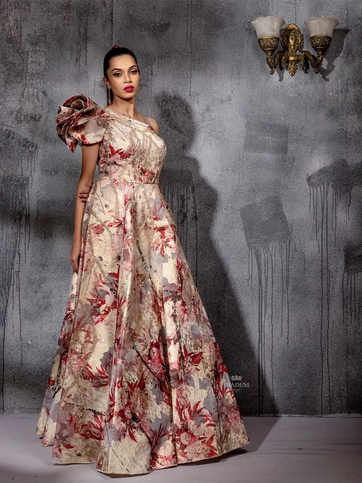 Ivory Gown Adorned With Floral Prints And Shimmers