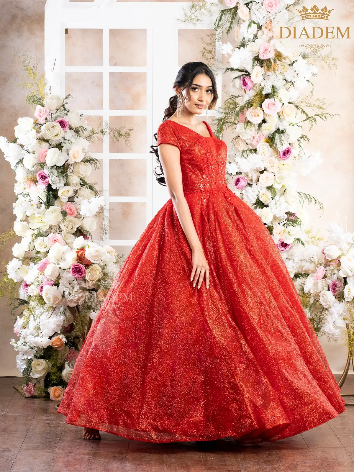 Red Net Ball Gown Embellished With Shimmers And Floral Laces