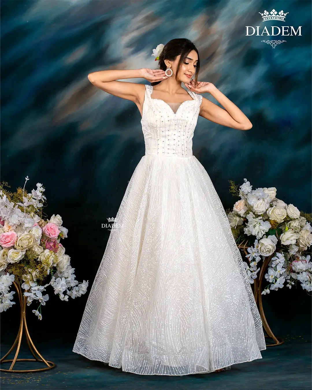 White Net Gown Embellished With Sequins And Thread Work
