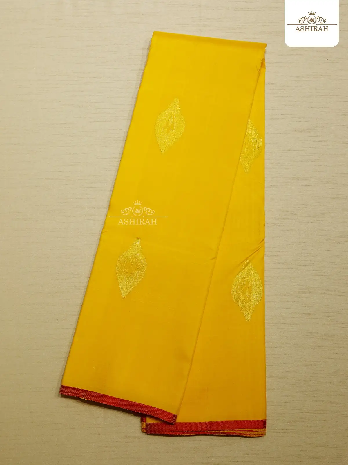 Yellow Pure Kanchipuram Silk Saree With Design Motifs On The Body And Without Border