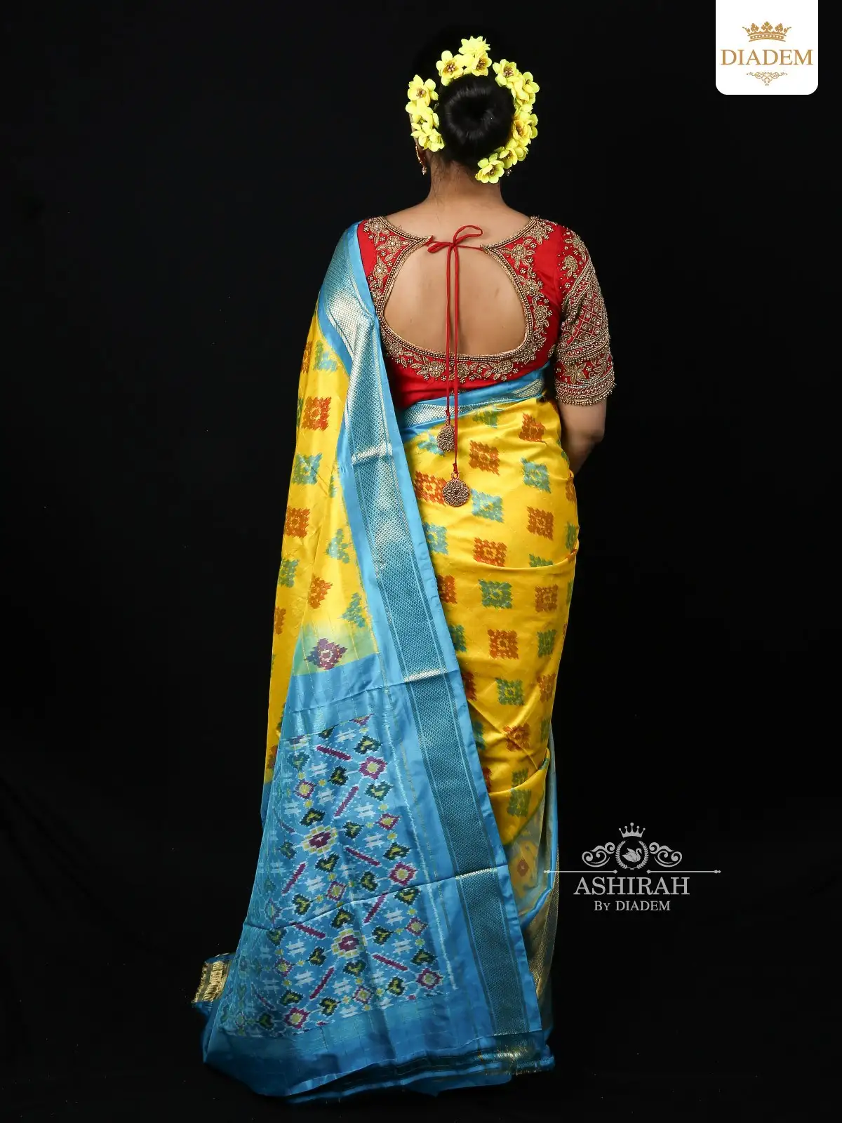 Lemon Yellow Patola Silk Saree With Ikkat Prints On The Body And Zari Border