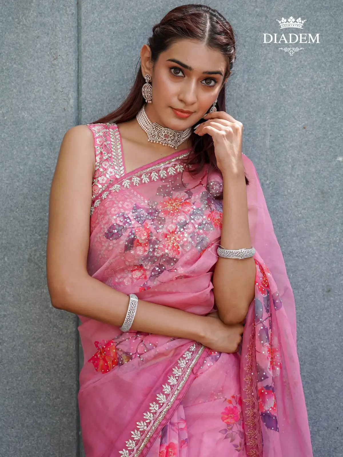 Pink Semi Organza Saree Adorned With Floral Prints And Embroidered Border