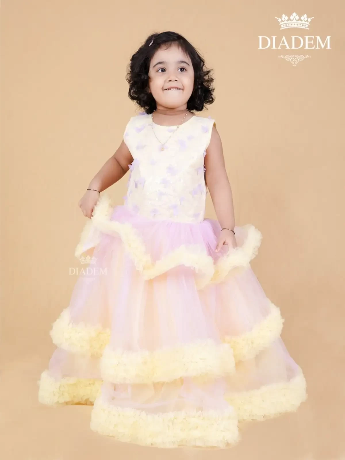 Oyster Pink Ruffled Gown With Butterfly Designs