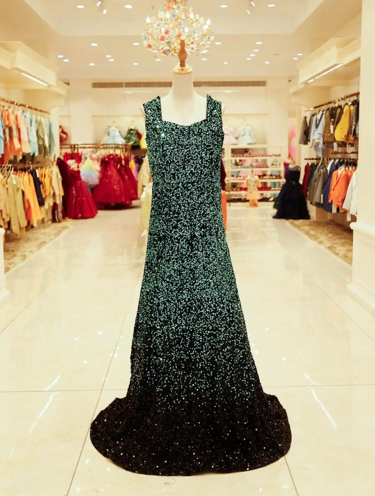 Dark Green Gown Enhanced with Sequins