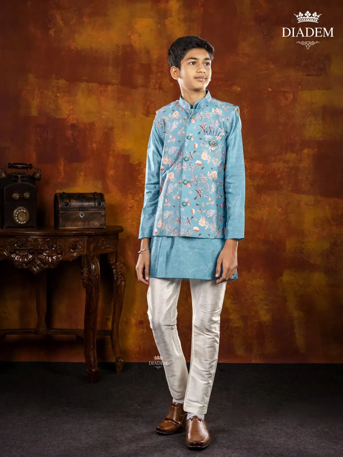 Blue Indo Western Sherwani Adorned In Floral Prints With Waistcoat And Brooch