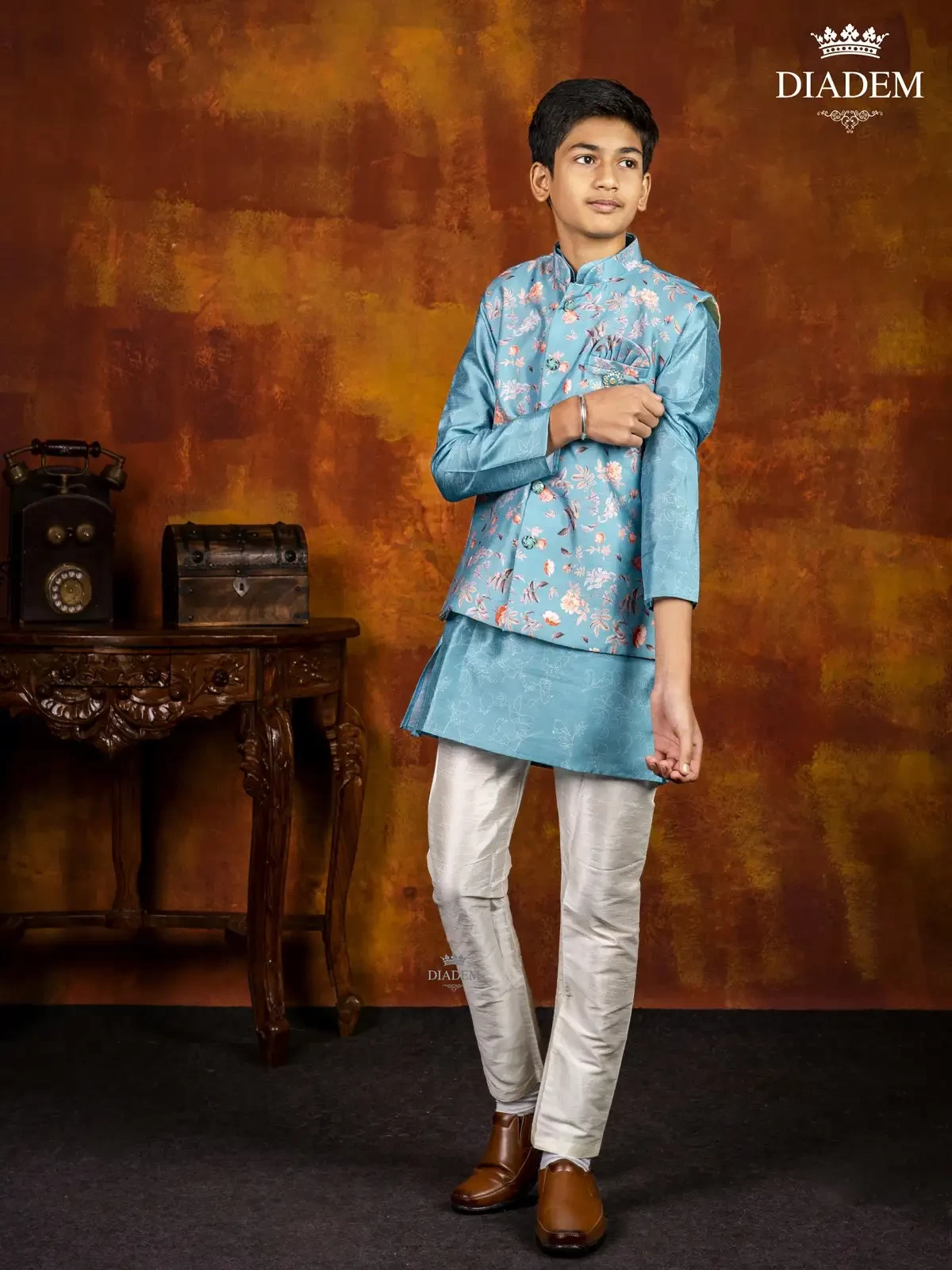 Blue Indo Western Sherwani Adorned In Floral Prints With Waistcoat And Brooch