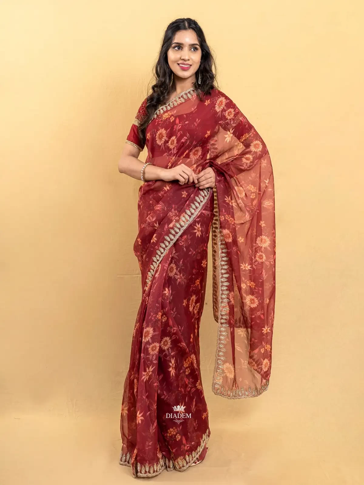 Dark Red Organza Silk Saree Embellished In Floral Prints And Embroidery Border