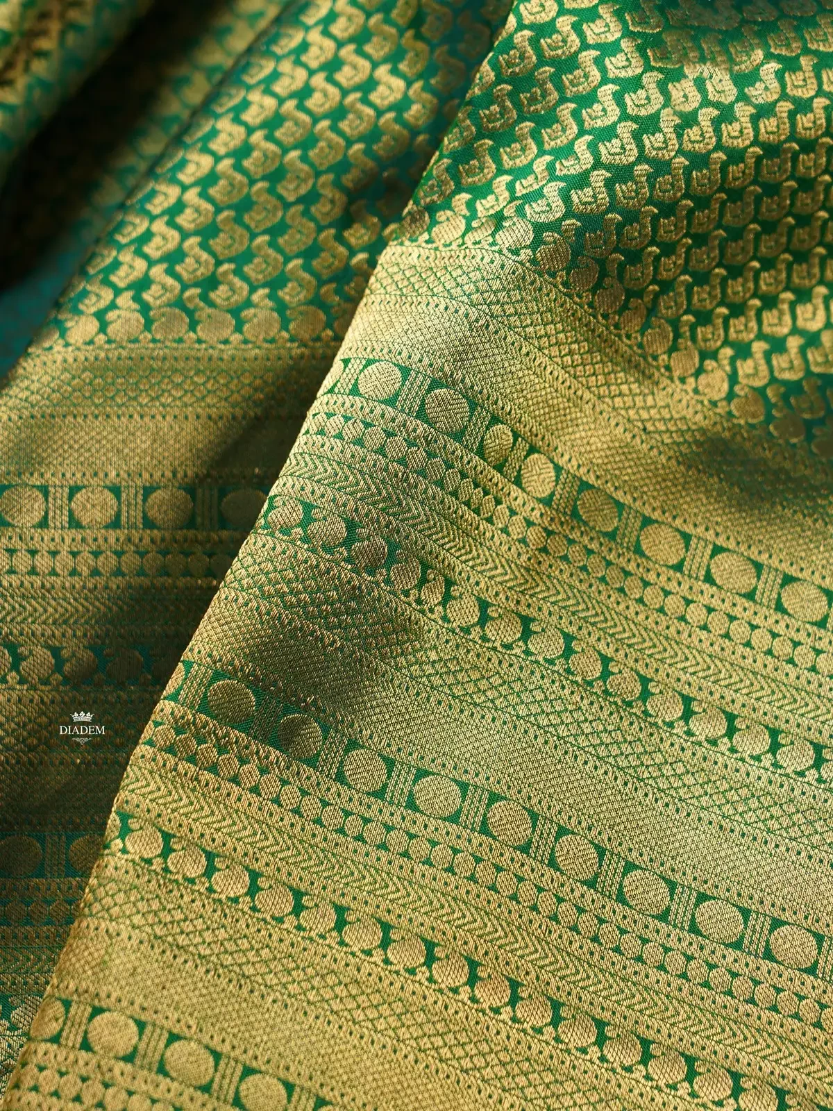 Dark Green Pure Kanchipuram Silk Saree With Design Motifs On The Body And Zari Border