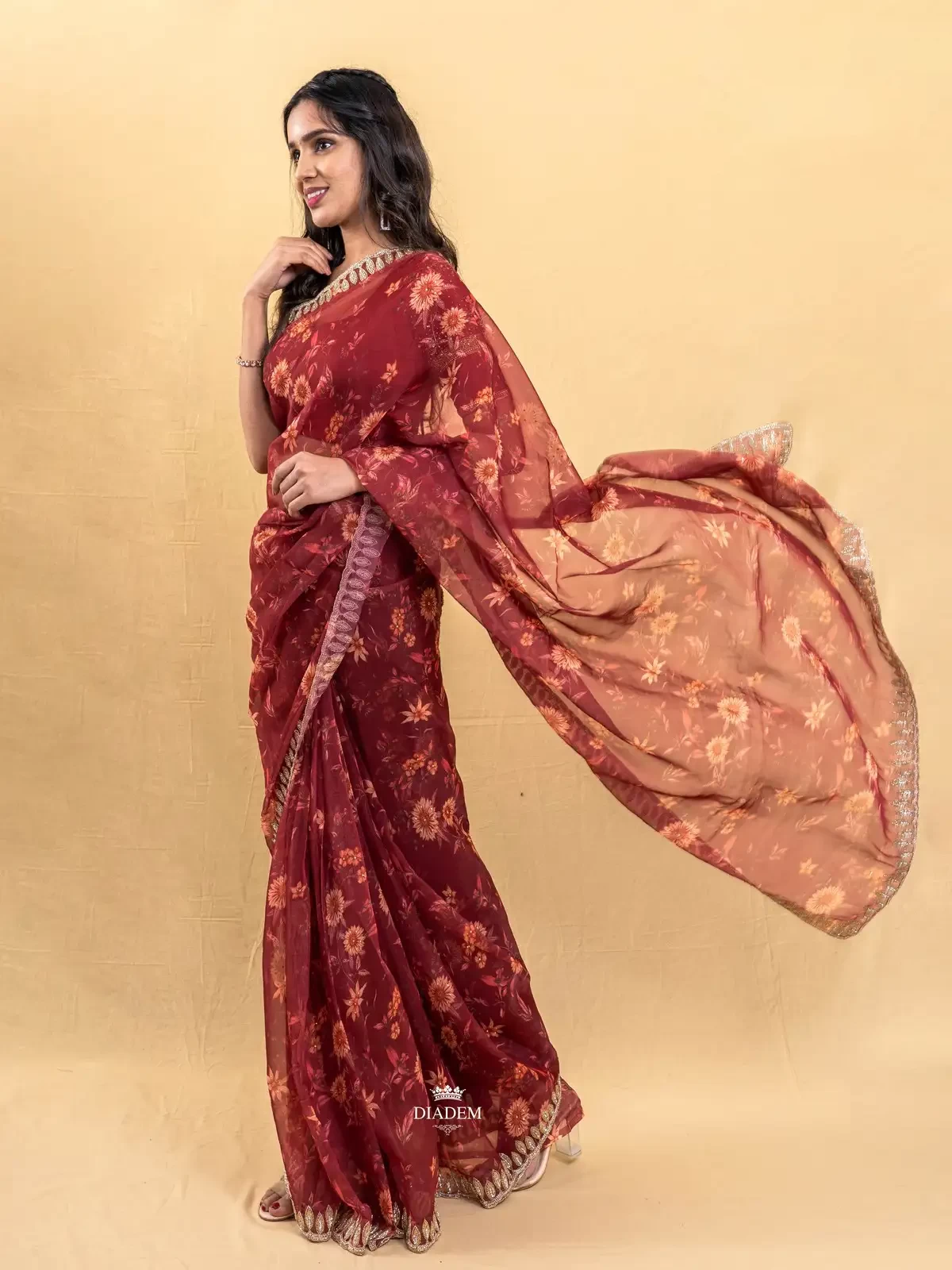 Dark Red Organza Silk Saree Embellished In Floral Prints And Embroidery Border