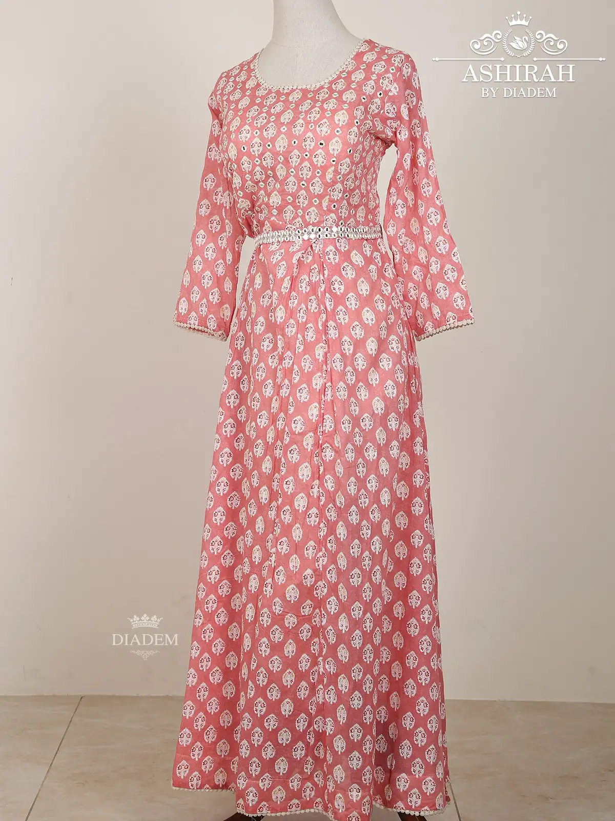 Pink Long Kurti Adorned In Floral Threads And Mirrors With Waist Belt