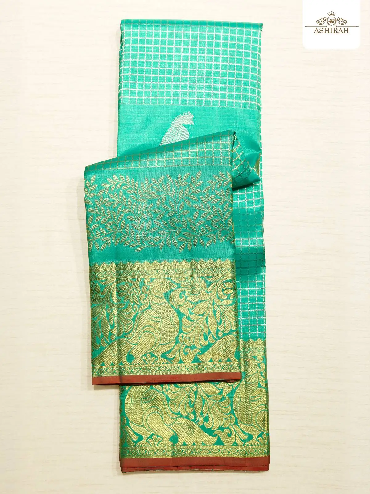 Light Green Pure Kanchipuram Silk Saree With Checks Designs On The Body And Peacock Motifs Zari Border