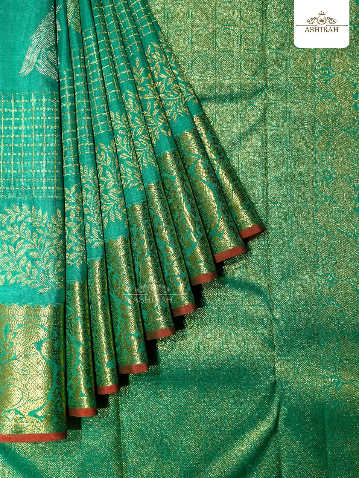 Light Green Pure Kanchipuram Silk Saree With Checks Designs On The Body And Peacock Motifs Zari Border