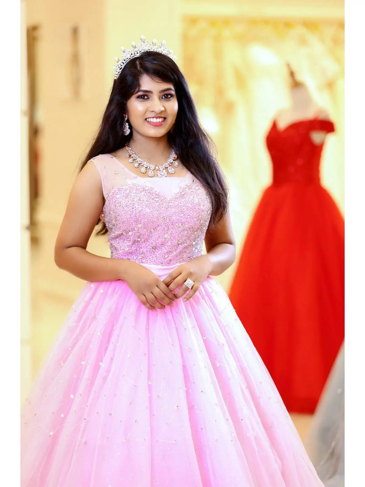 Light Pink Ball Gown Adorned with Beads and Waist Belt