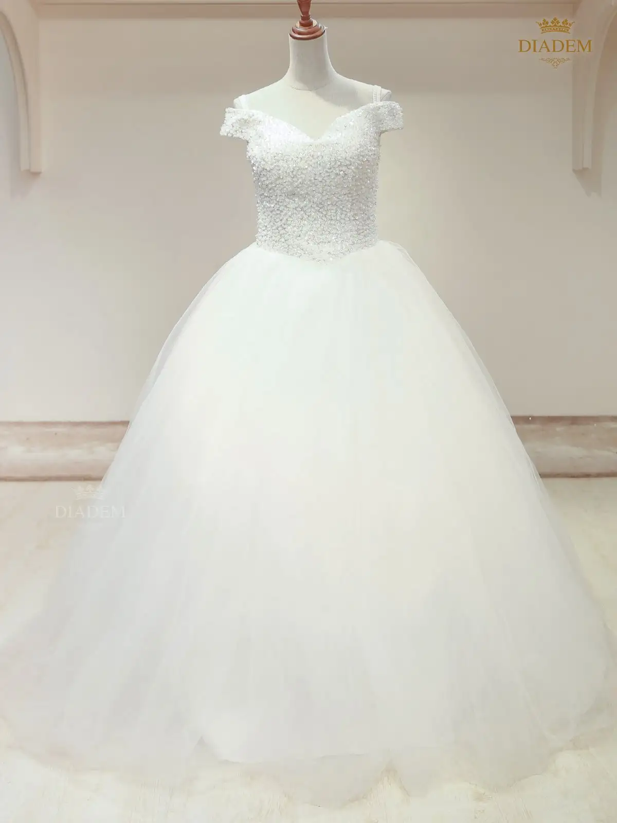 White Wedding Ball Gown Enhanced With Floral Laces