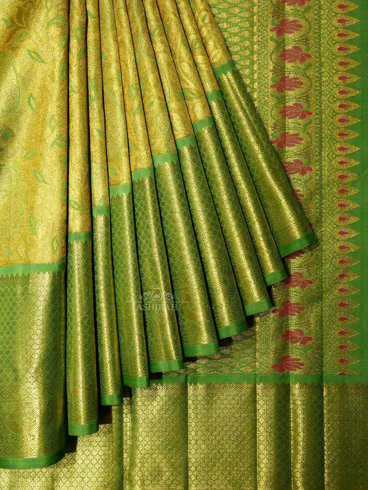 Green Pure Kanchipuram (Bridal) Silk Saree with Brocade all over the body and Design Motifs Zari Border