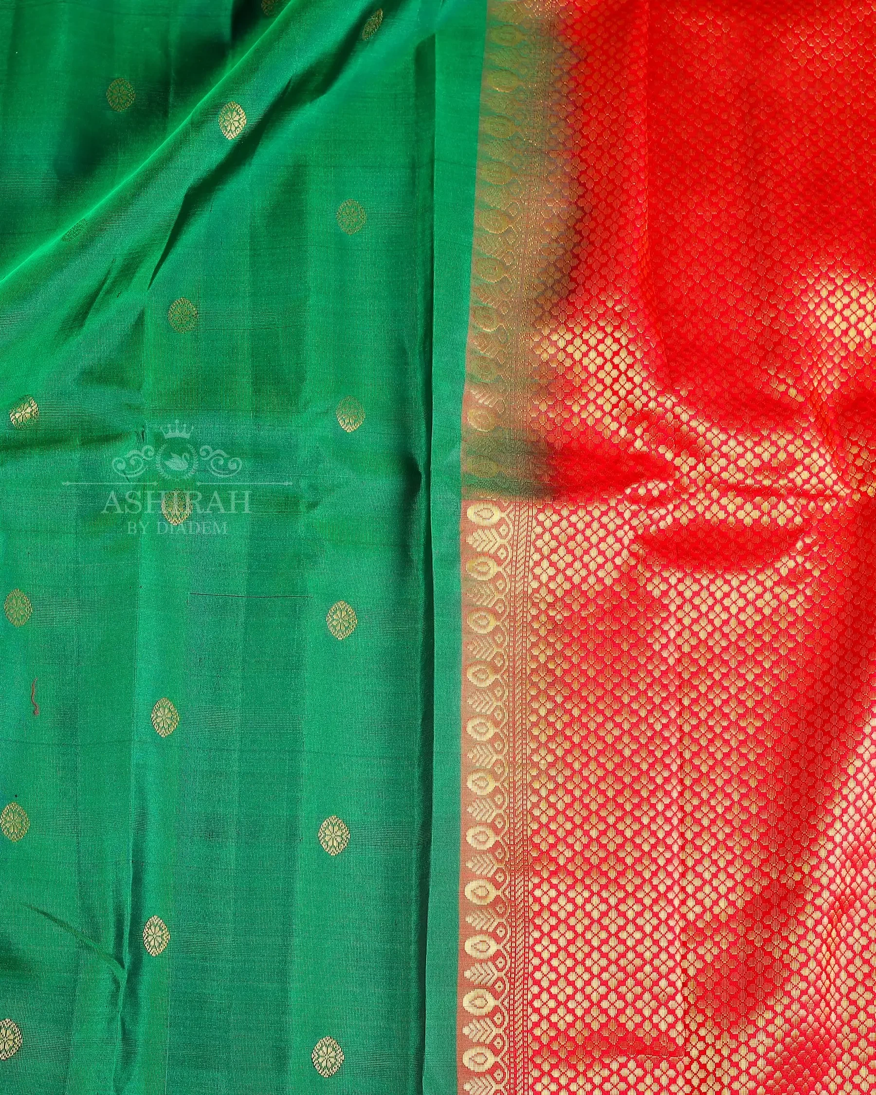 Green Soft Silk Saree With Design Motifs On The Body And Zari Border
