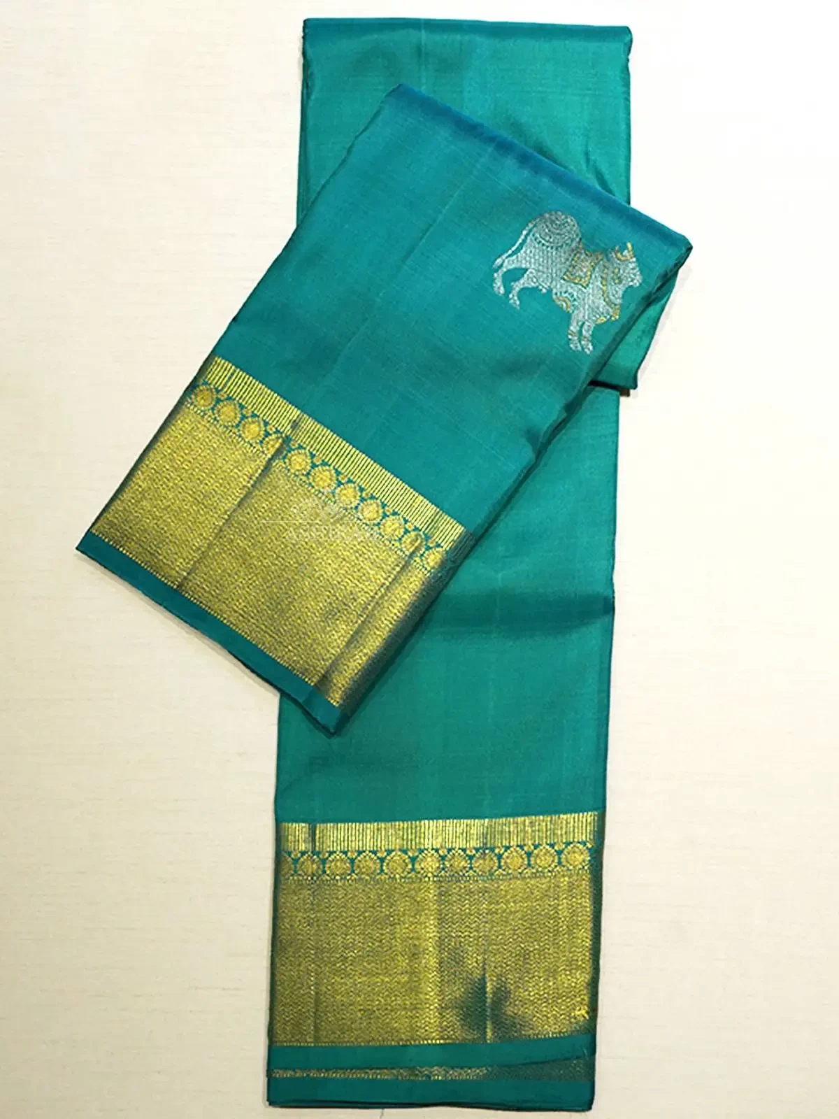 Teal Pure Kanchipuram Silk Saree With Animal Motifs On The Body And Design Motifs Zari Border
