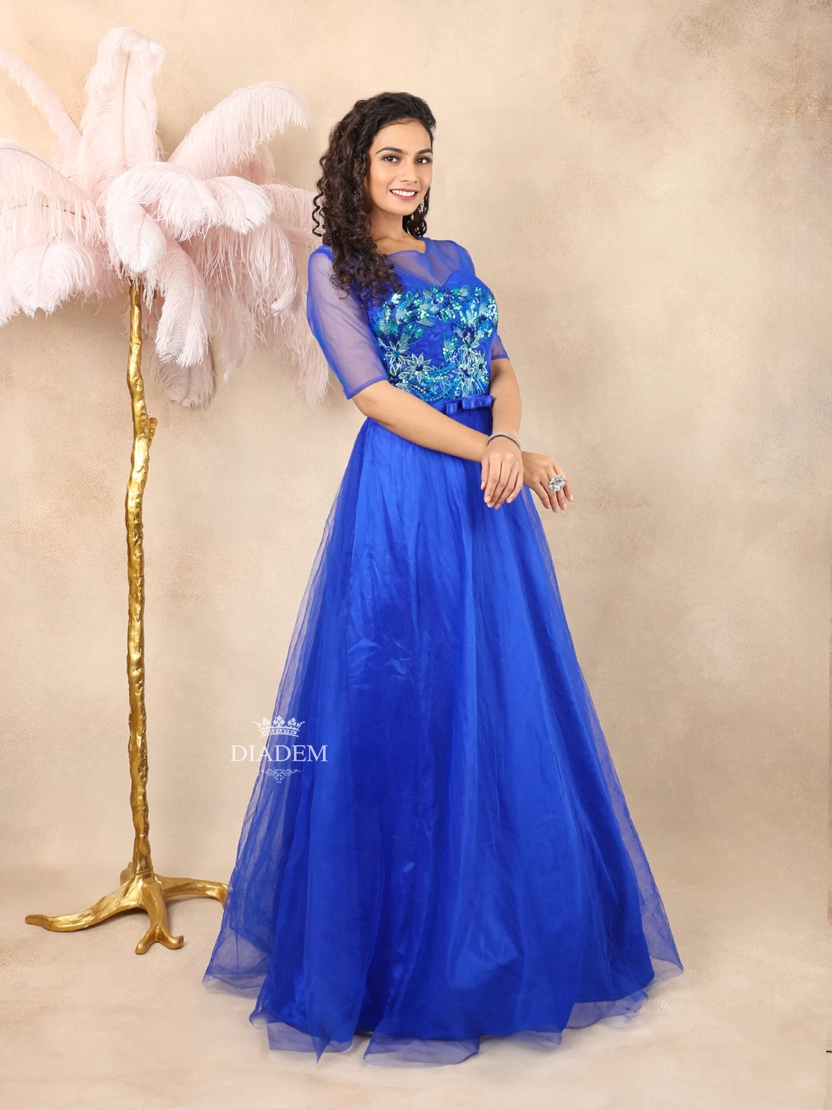 Sapphire Blue Net Gown Embellished With Floral Threadwork Embroidery And Sequins