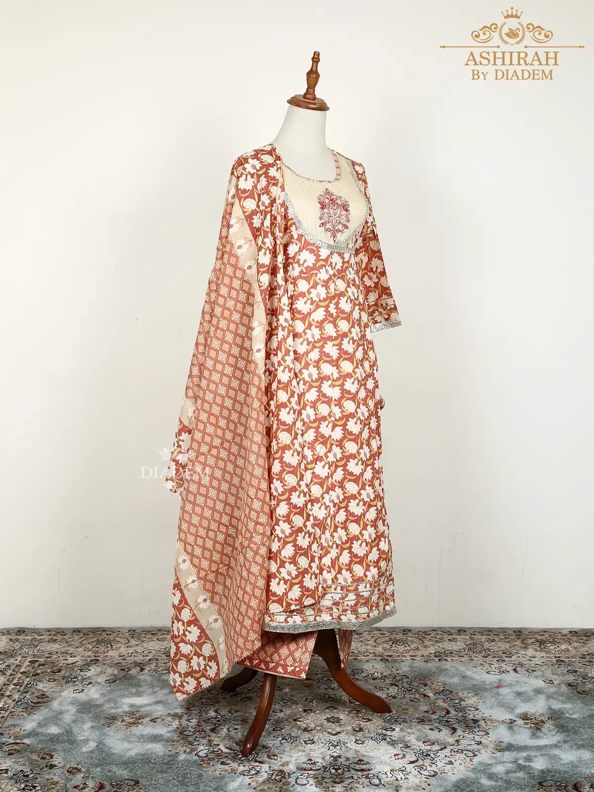 Dark Peach Straight Cut Suit Adorned In Floral Prints And Zari With Dupatta