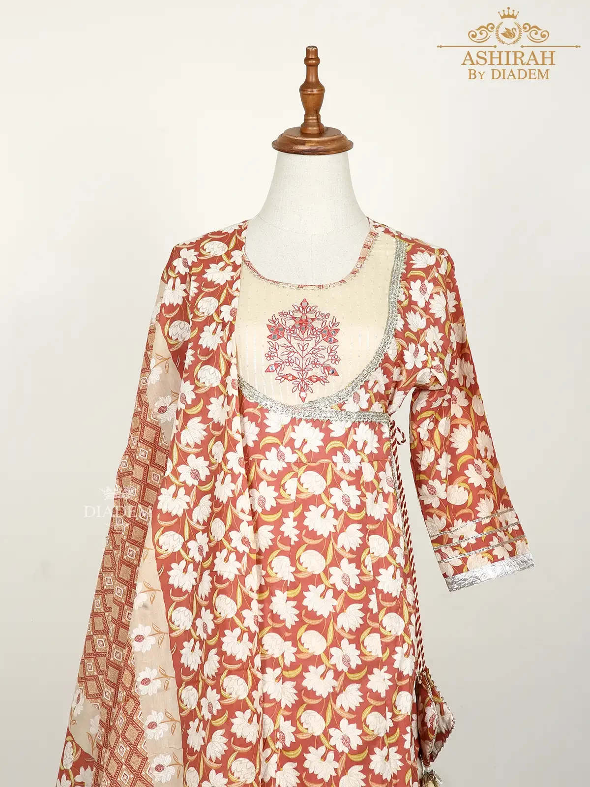 Dark Peach Straight Cut Suit Adorned In Floral Prints And Zari With Dupatta