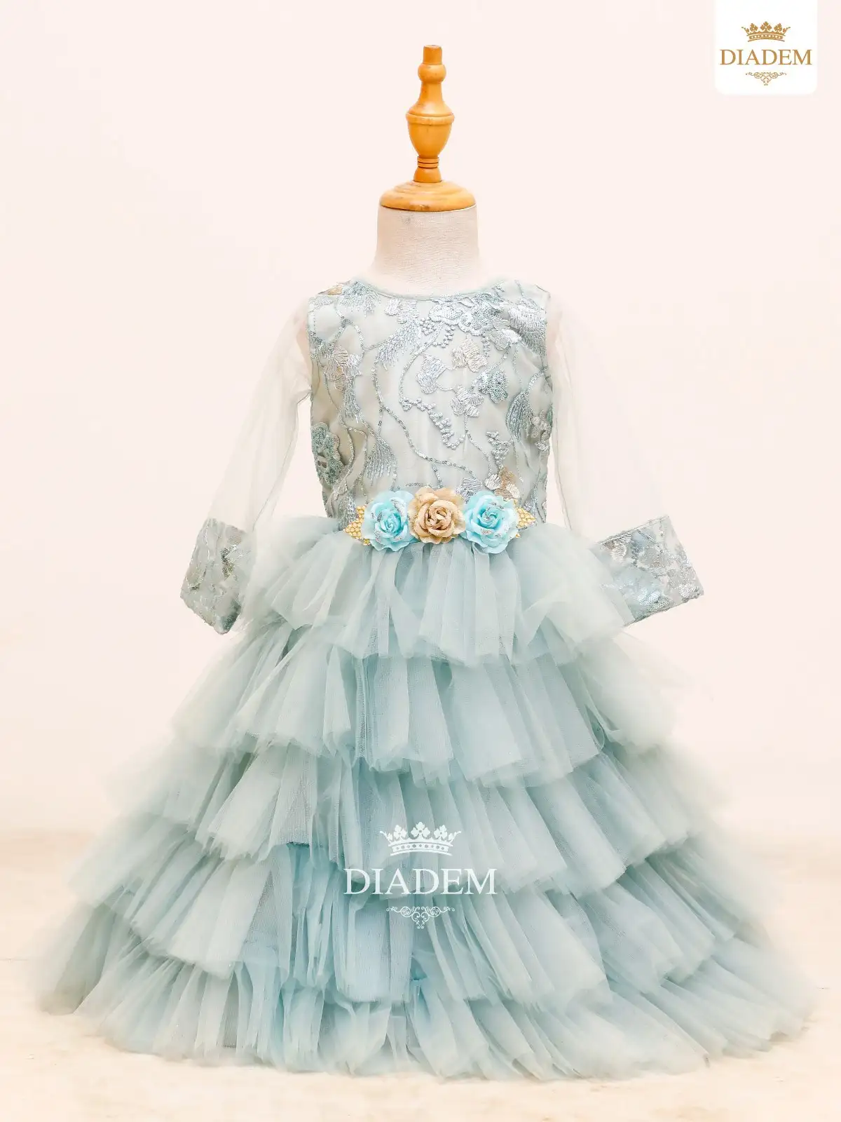 Light Blue Net Gown Embellished With Sequins And Floral Buds