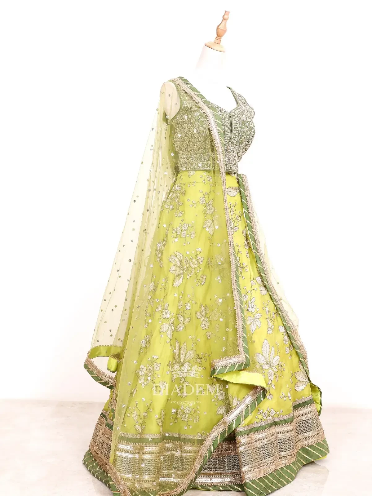 Olive Green Silk Lehenga  With Floral Embroideries And Dupatta