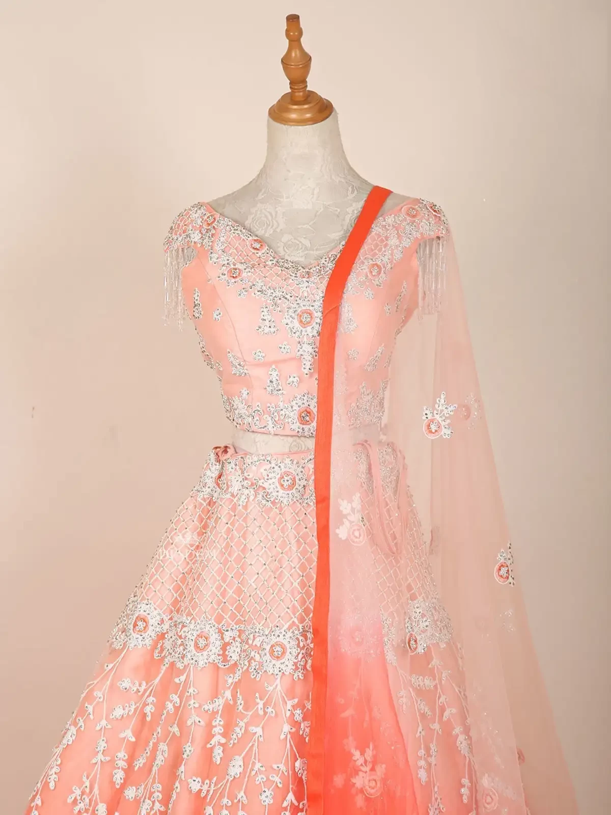 Orange Ombre Lehenga Adorned In Floral Stones And Laces With Dupatta