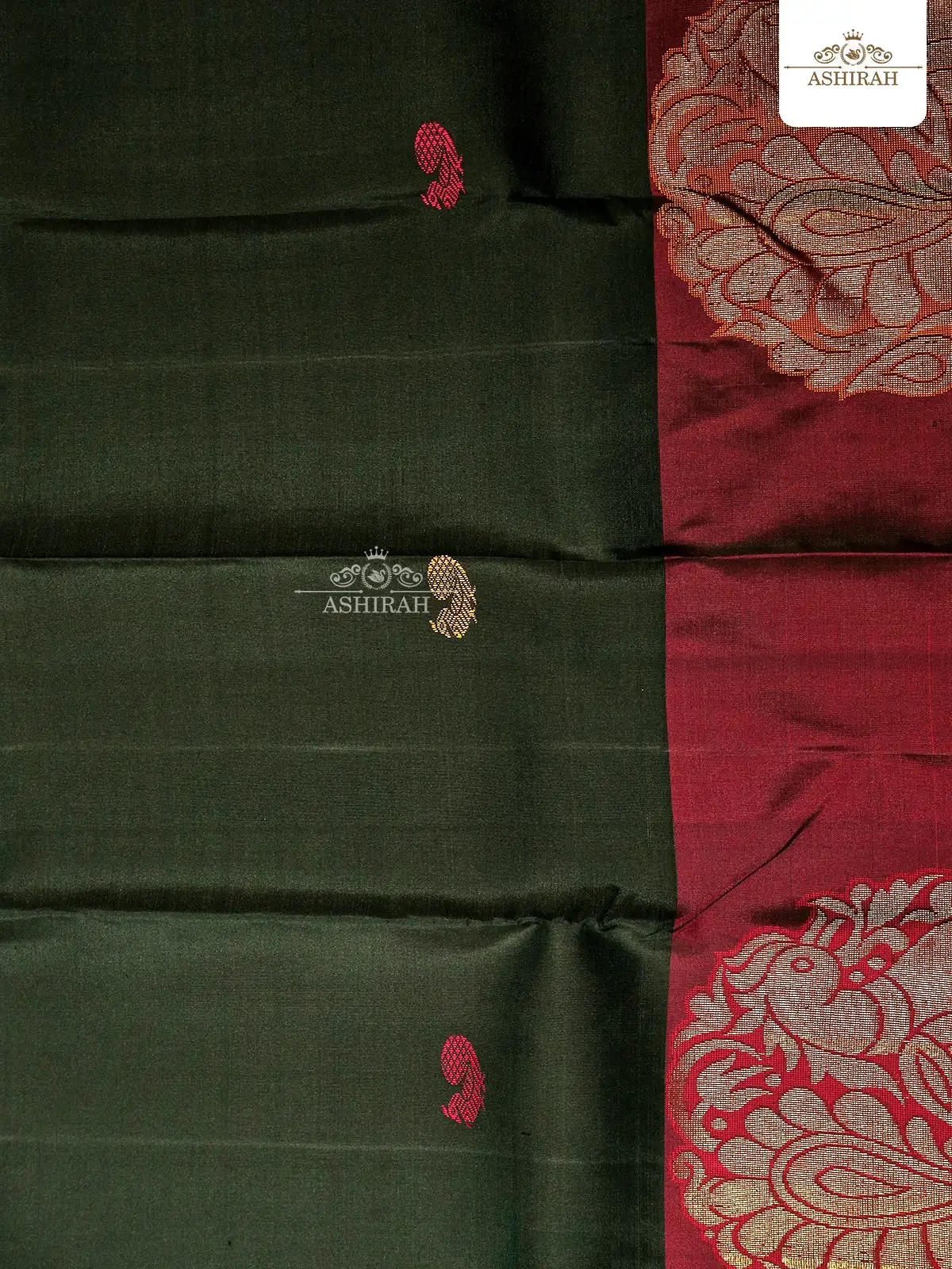 Dark Green Pure Kanchipuram Silk Saree With Peacock Motifs On The Body And Zari Border